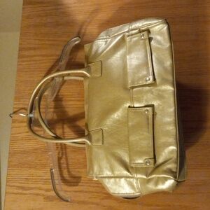 Womens Nina ricci large bag gold with handles pockets outside inside small stain